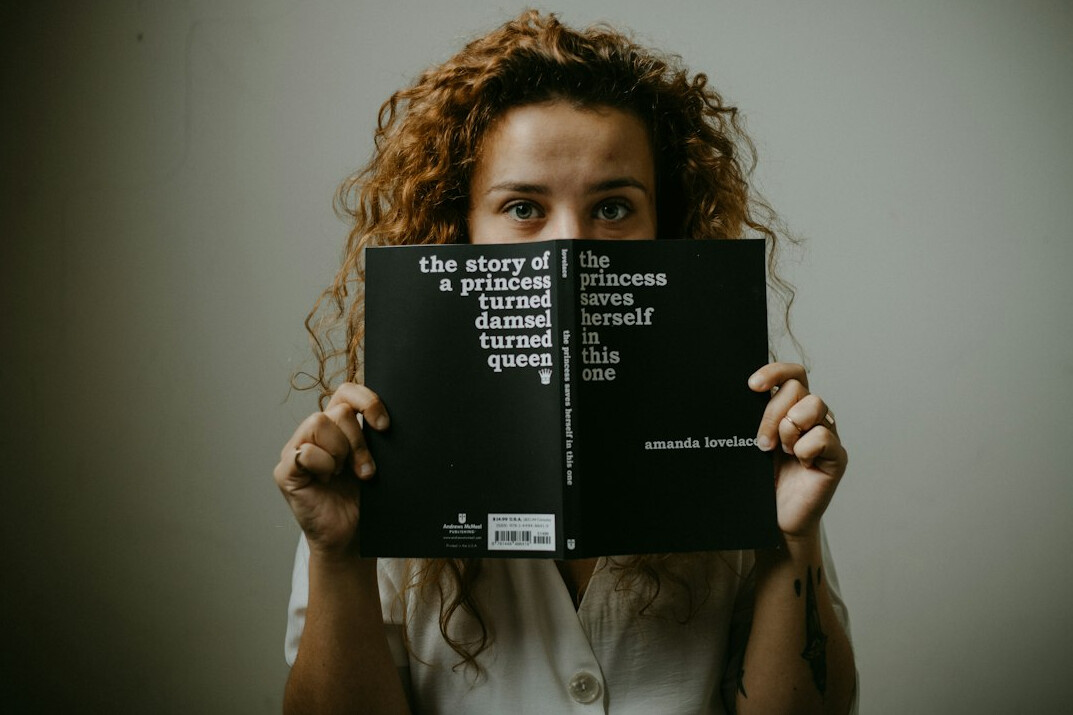 surprised reader closing book
