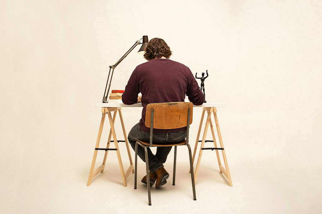 mystery writer at desk